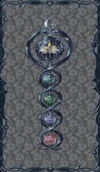 Tarot of the Enchanted Garden by Rossana Pala, a 78-card Lo Scarabeo tarot with fairy-like figures, silver tones and dreamlike botanical artwork.