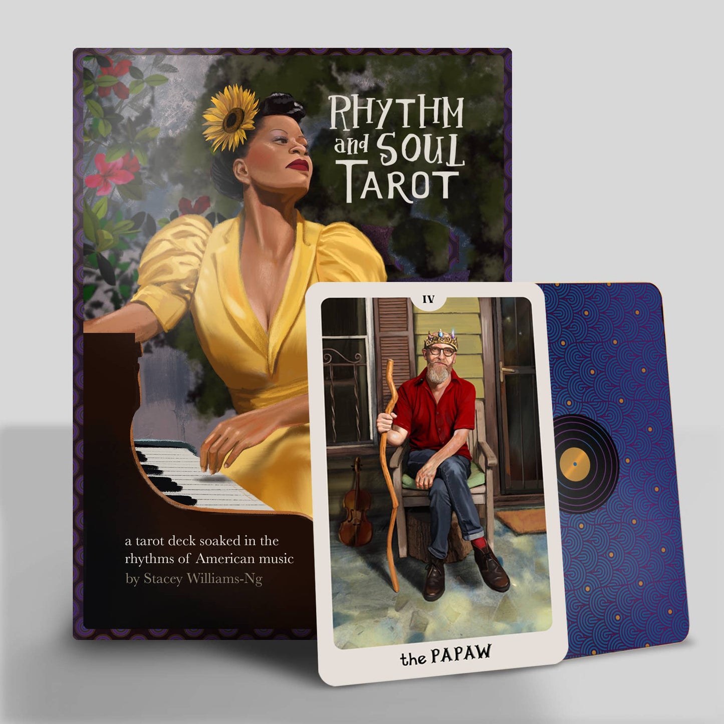 Rhythm and Soul Tarot book with tarot card featuring a man with a bow and arrow on a gray background
