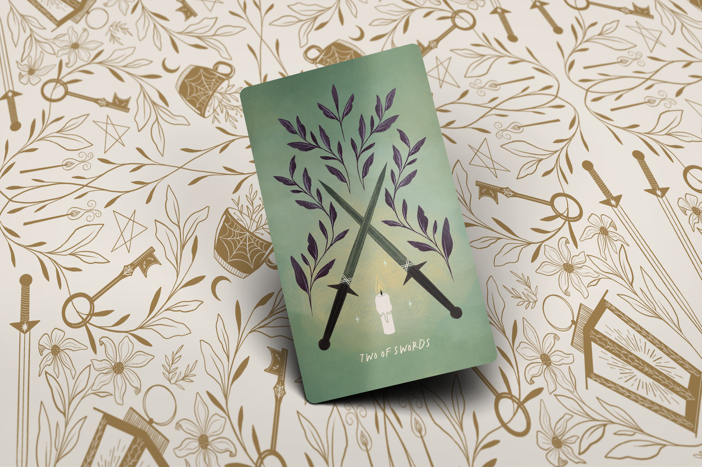 Green book with floral design on a patterned background