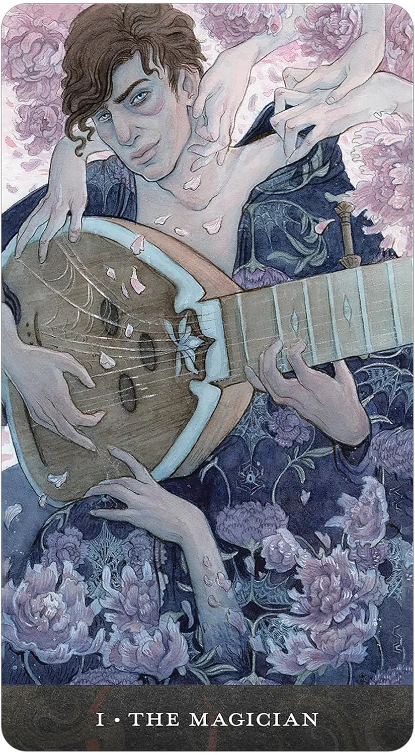 Blood Moon Tarot deck by Sam Guay with burgundy edged tarot cards and hardcover guidebook.