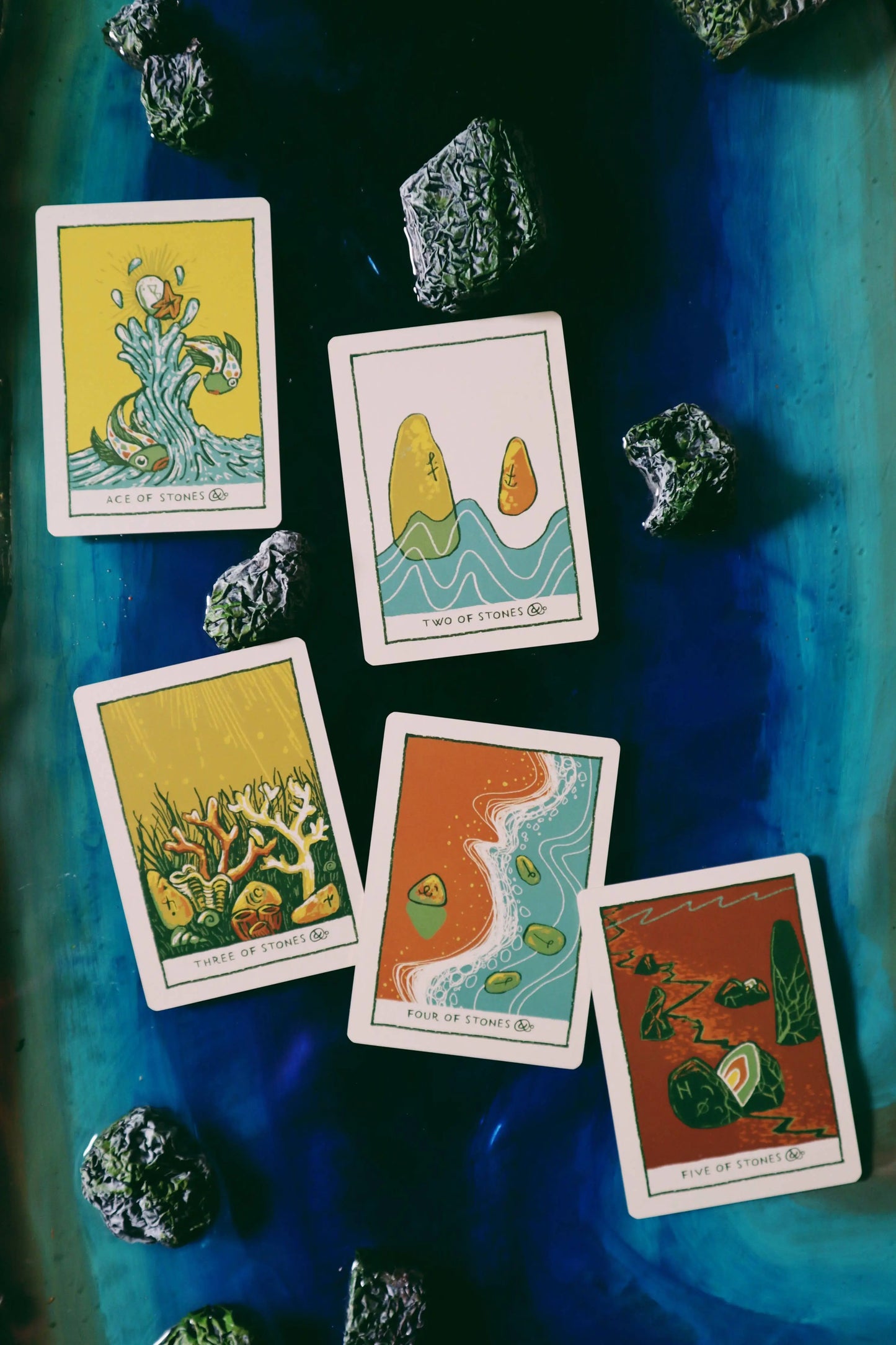 Image featuring 5 tarot cards from the Green glyphs Indie tarot deck by James R Reads. Creator of Primsa Visions card collection