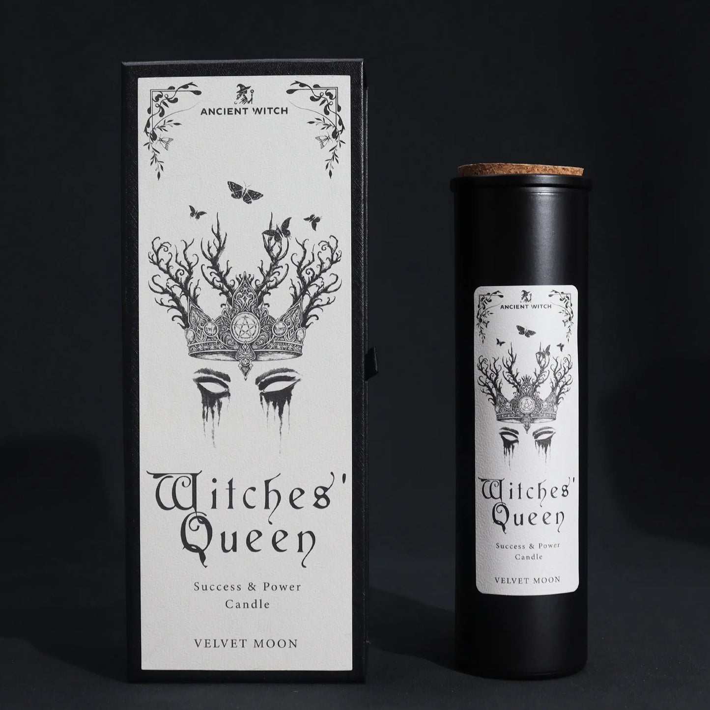 Witches' Queen candle packaging with black and white design on a dark background