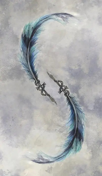 Decorative earring with blue feathers and intricate metal design on a textured gray background