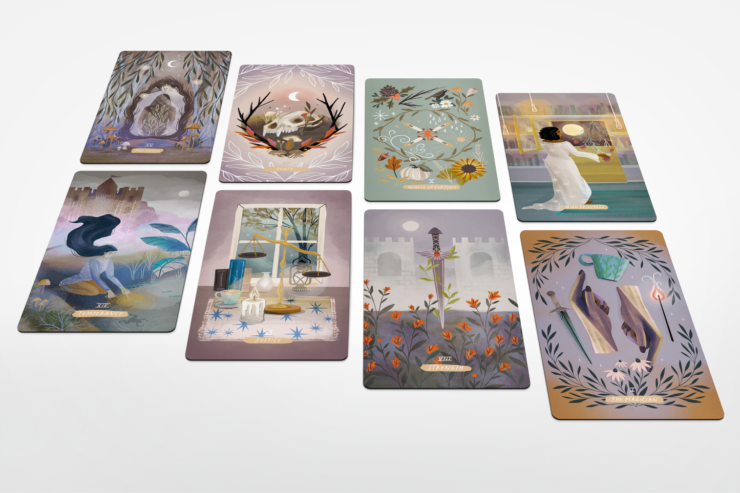 Set of tarot cards with various designs on a white background