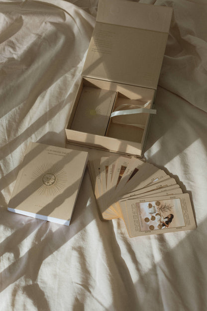 Lucid Dreams Beginner's Tarot Beige Edition IV by ST. SOLEIL with gold foil cards, matte gold edges and guidebook