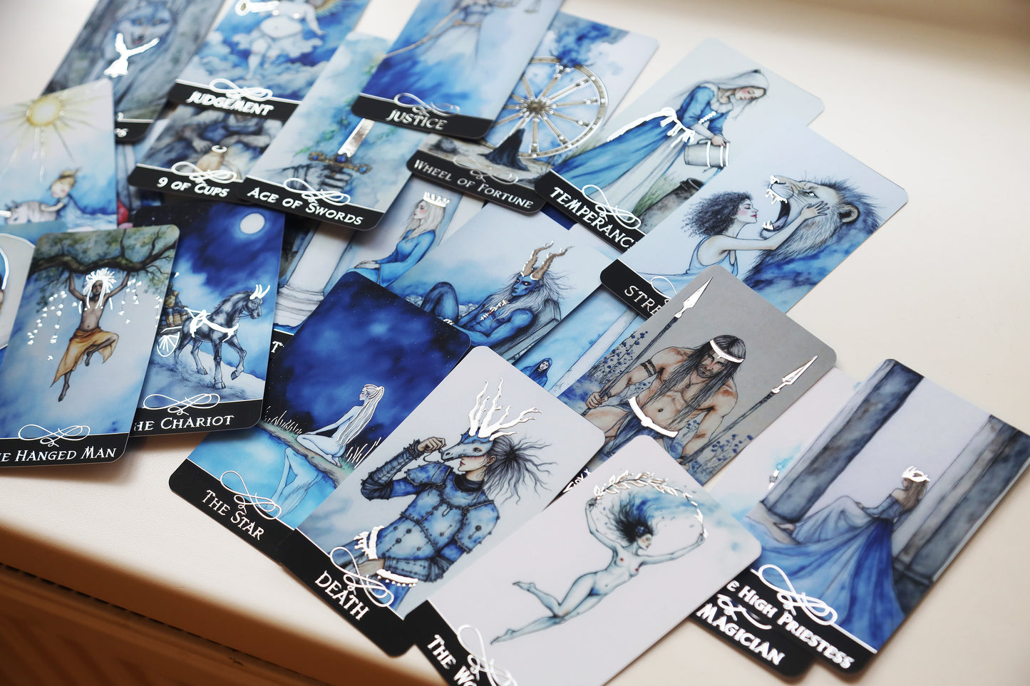 The Blue Tarot UK Exclusive Edition featuring cyanotype-inspired artwork by Kateryna and two exclusive UK alternate cards including The Hermit and The Magician.