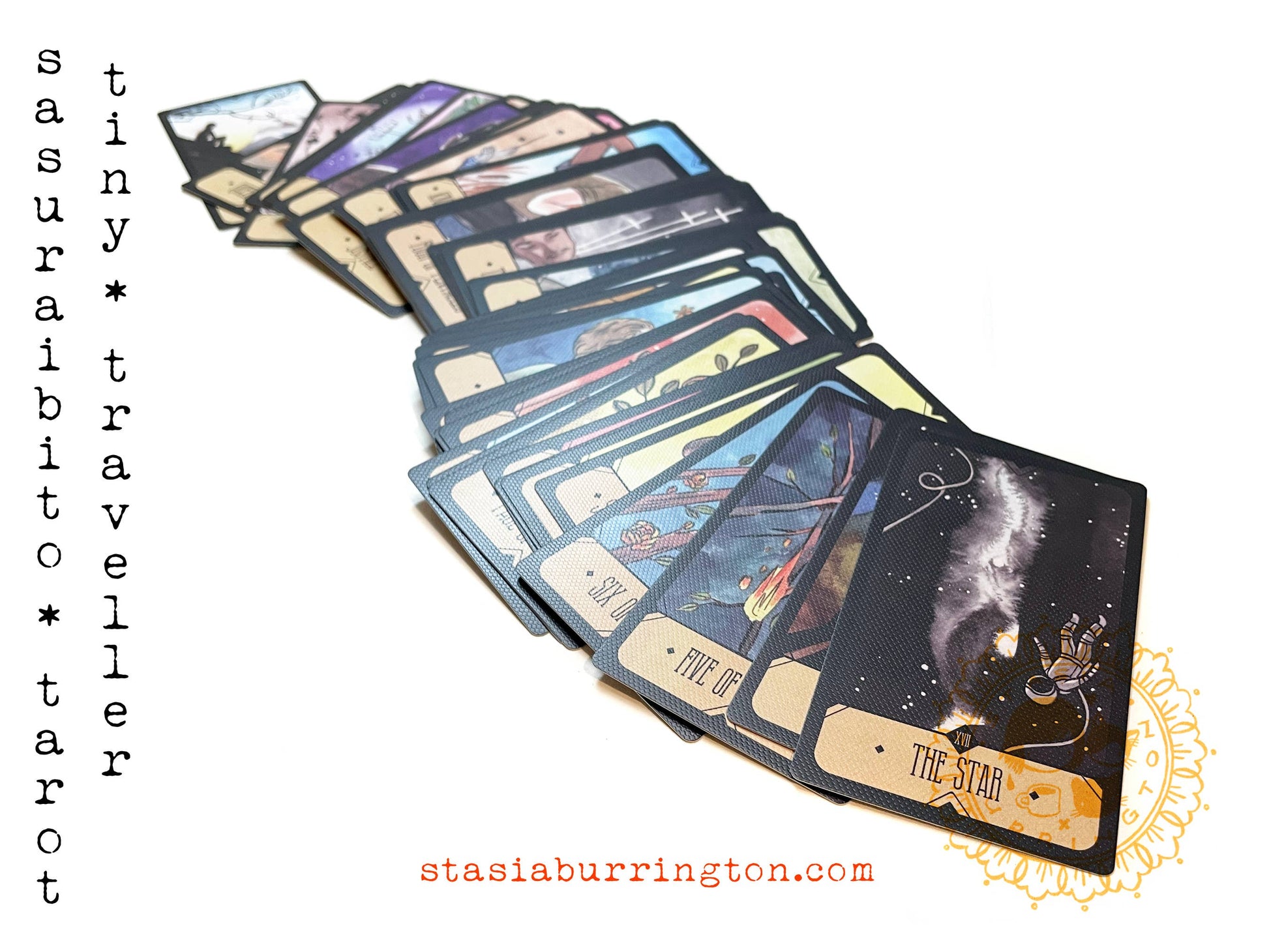 Collection of tarot cards from 'tiny traveller tarot' with visible branding.