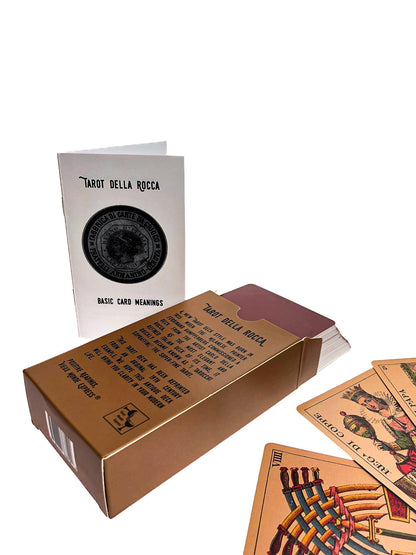Tarot cards with a cardboard box and leaflet on a white background Tarot Della Rocca historical Italian tarot deck based on Carlo Della Rocca's nineteenth-century Tarocco Sopraffino with 78 beautifully engraved cards and companion guide.
