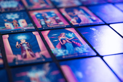 Collection of tarot cards with colorful artwork on a blue and purple gradient background