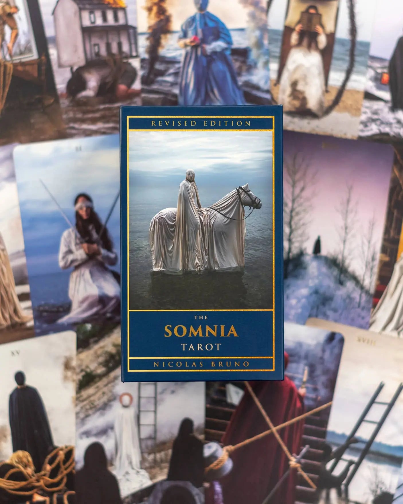 The Somnia Tarot book cover with tarot card images in the background
