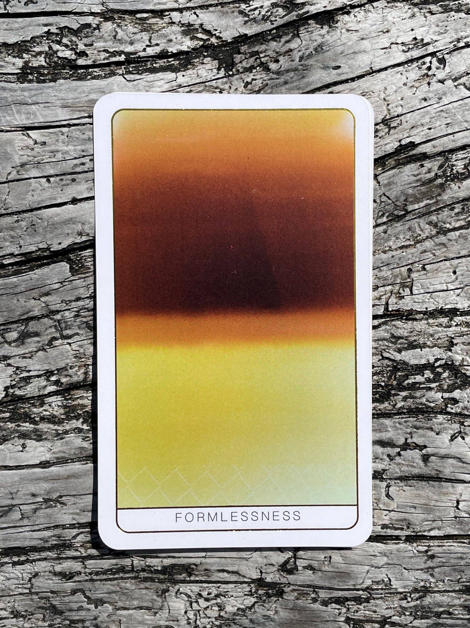 Death Doula Oracle Cards featuring original analogue 35mm photography with double exposure imagery, gold gilded edges and a guidebook for spiritual transformation and healing.