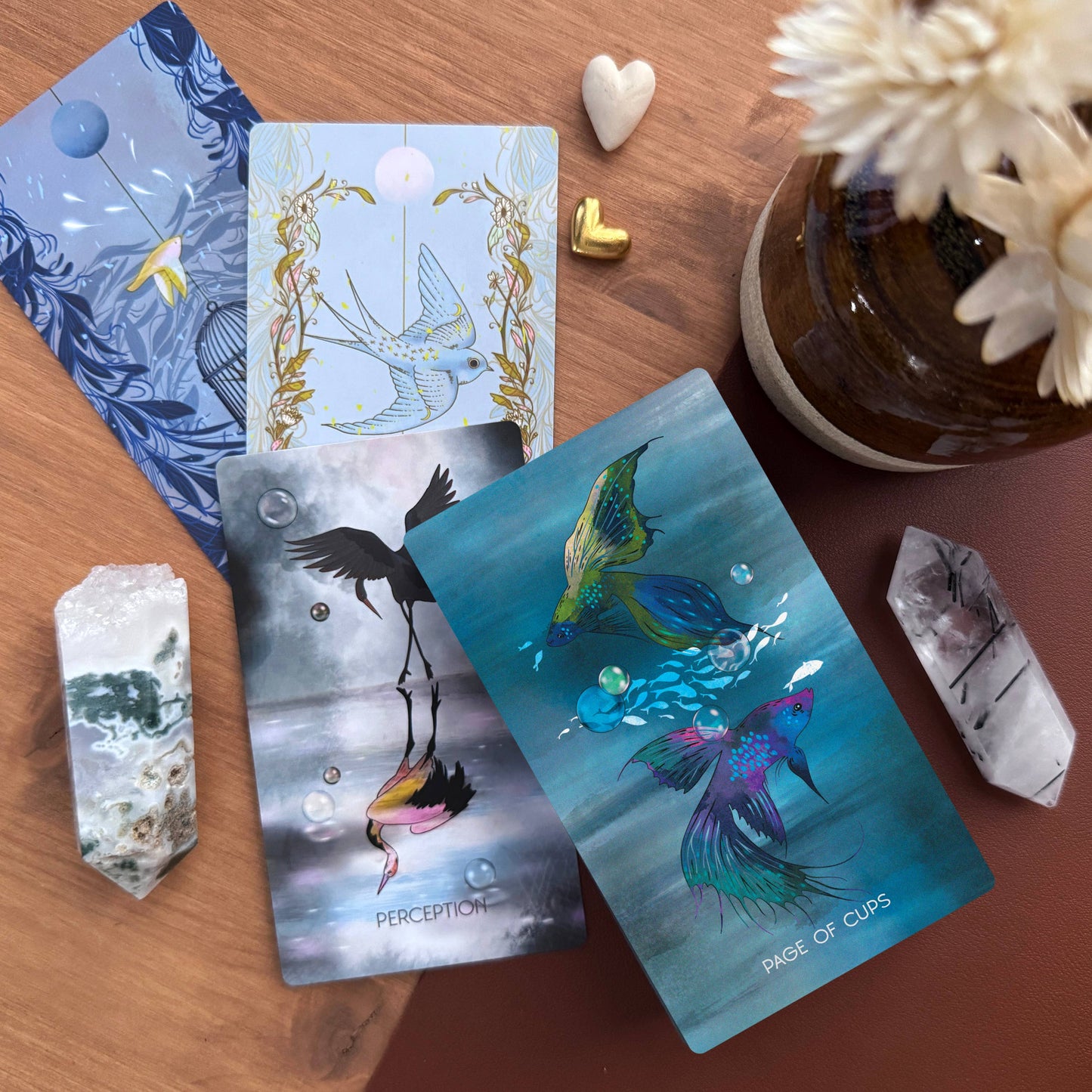 The Meraki Tarot 5th Edition by Kerri Snook featuring whimsical botanical tarot artwork and fantasy-inspired symbolism