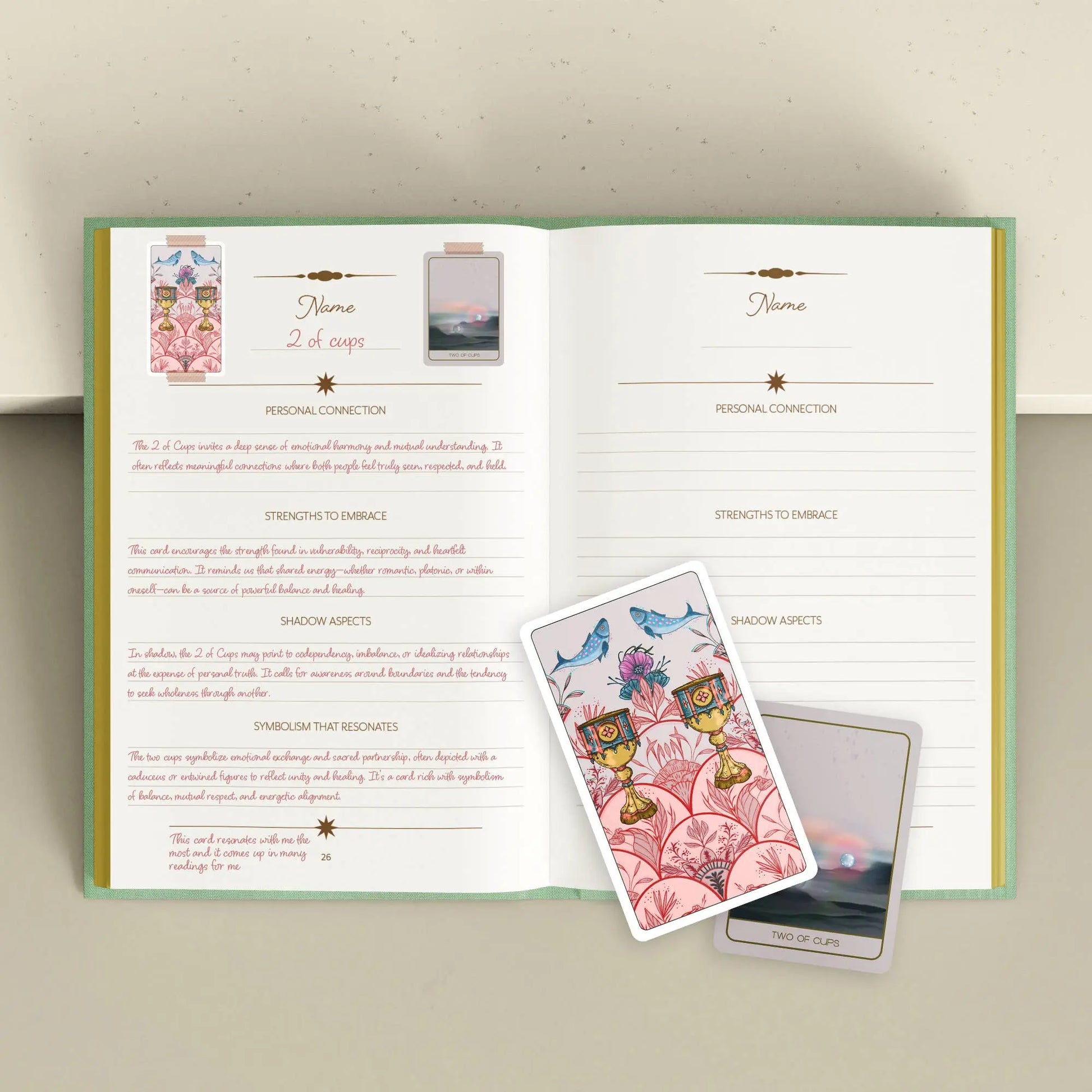 Open book with tarot cards on a light background Tarot Journal Bouchette and Co Oneness Emporium