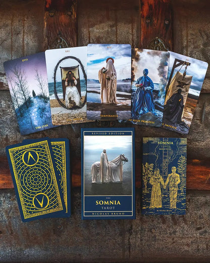 Somnia Tarot Revised Edition by Nicolas Bruno with surreal dream-inspired tarot artwork and gold gilded edges