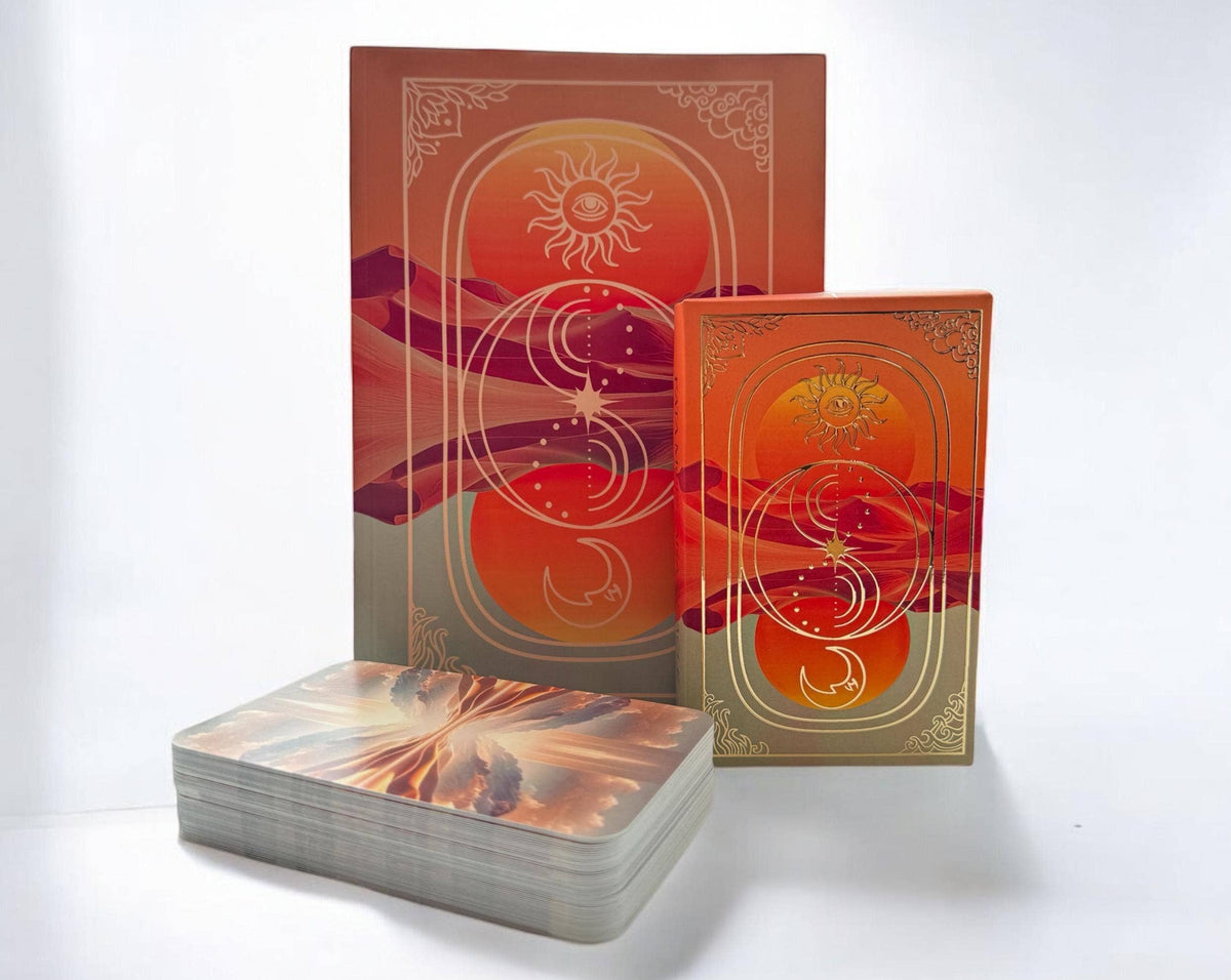 A deck of oracle cards with a matching box and a smaller card sleeve, all decorated with warm-toned celestial and landscape illustrations in orange, red, and gold on a white background.