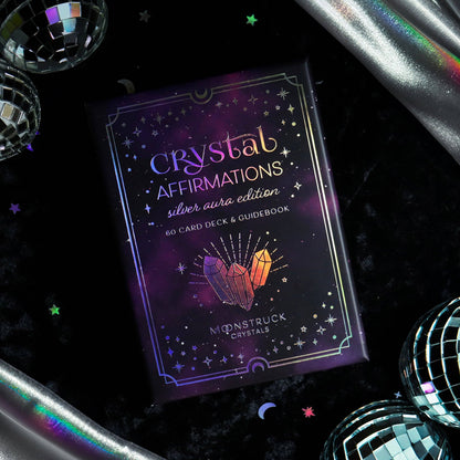 Crystal Affirmations card deck on a dark background with decorative elements