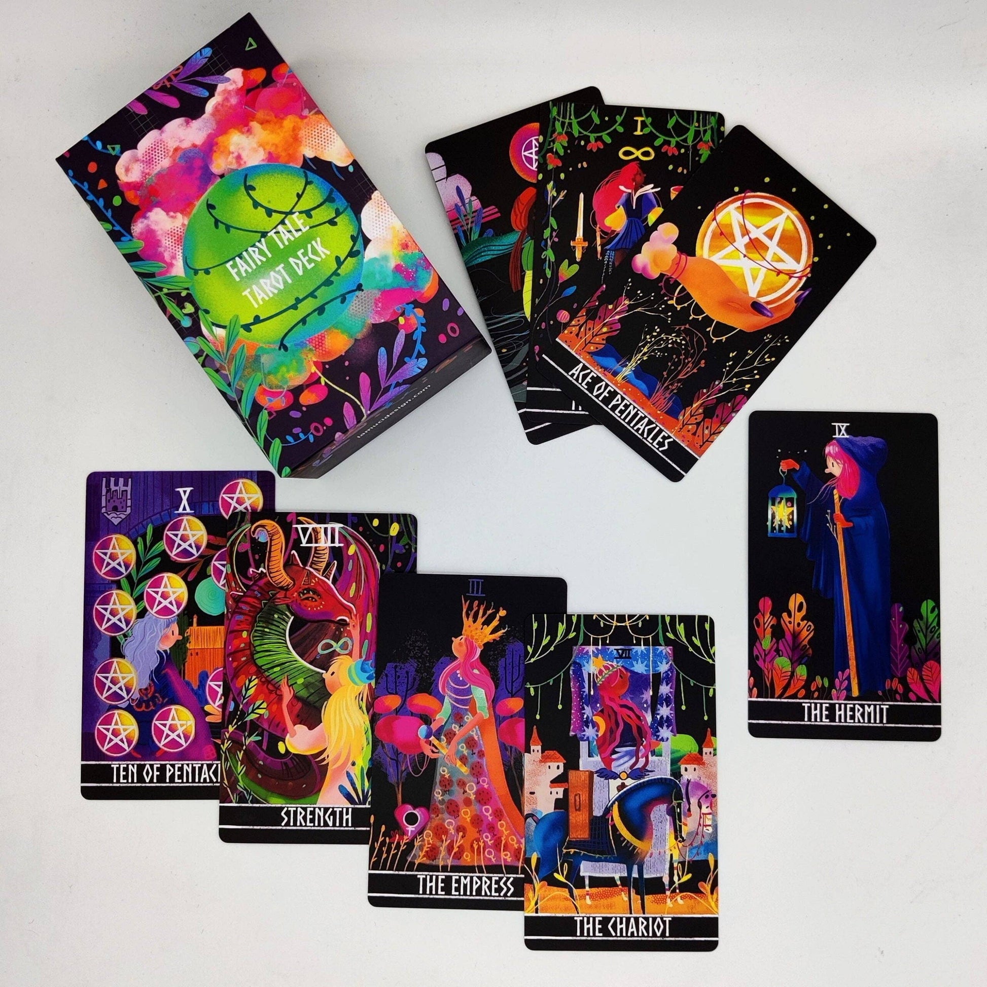 Colorful tarot cards with various designs on a white background