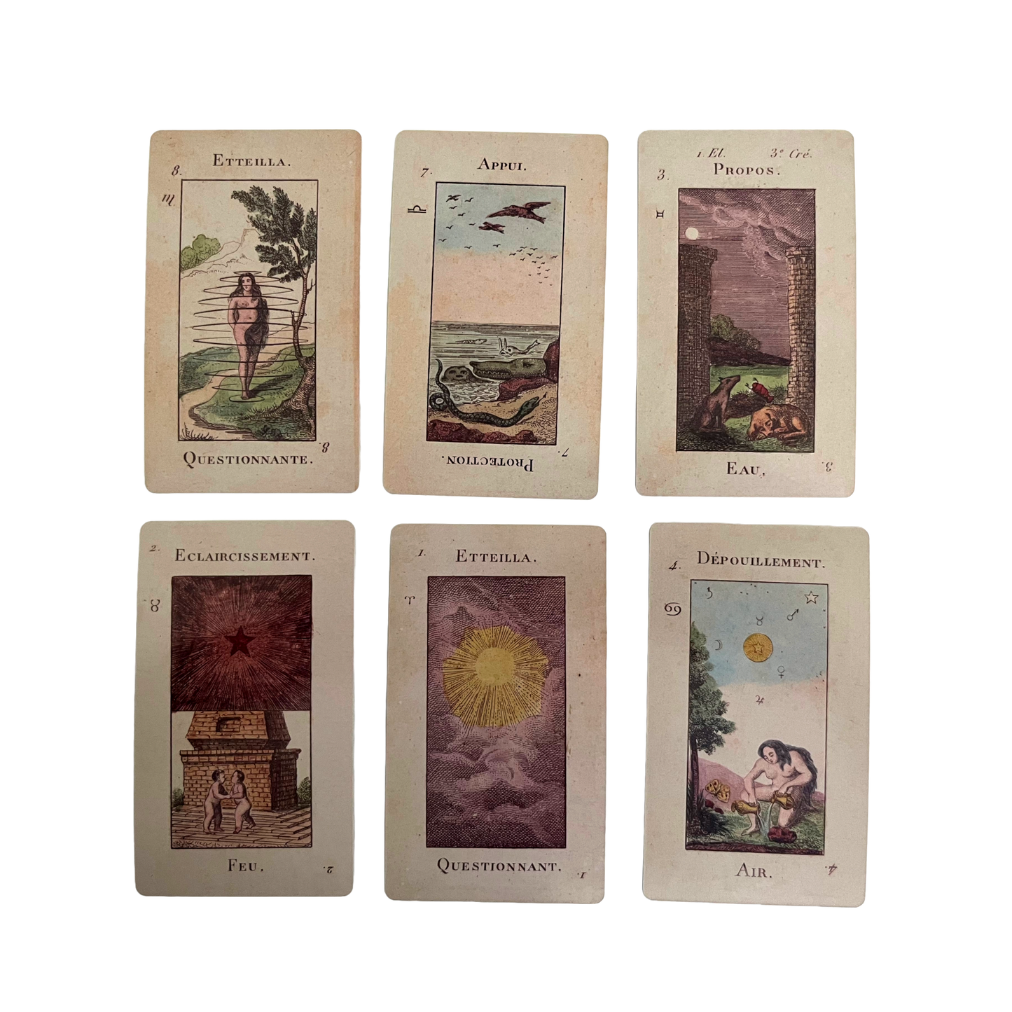 Set of six tarot cards with various illustrations and text on a white background