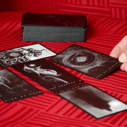 Black Tarot deck with minimalist black and white design and 78 tarot cards