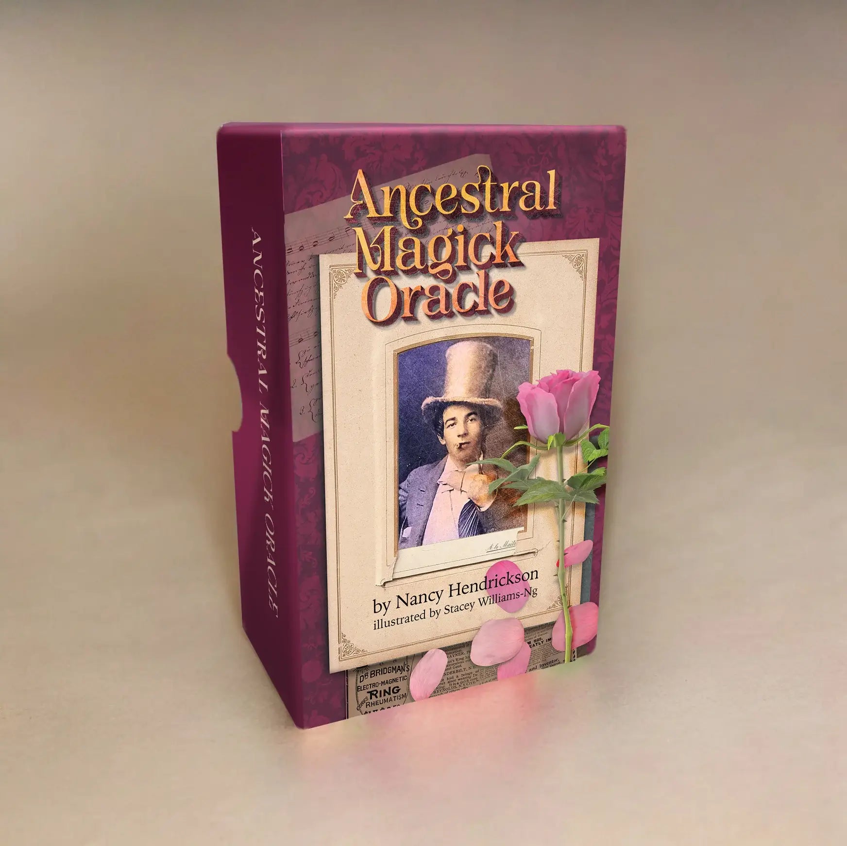 Ancestral Magick Oracle card deck packaging with a woman's portrait and pink flowers on a beige background