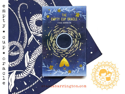 The Empty Cup Oracle by Stasia Burrington featuring minimalist black ink illustrations, gold-edged cards, and a foil-stamped collector's box.
