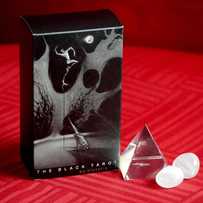 Black Tarot deck with minimalist black and white design and 78 tarot cards