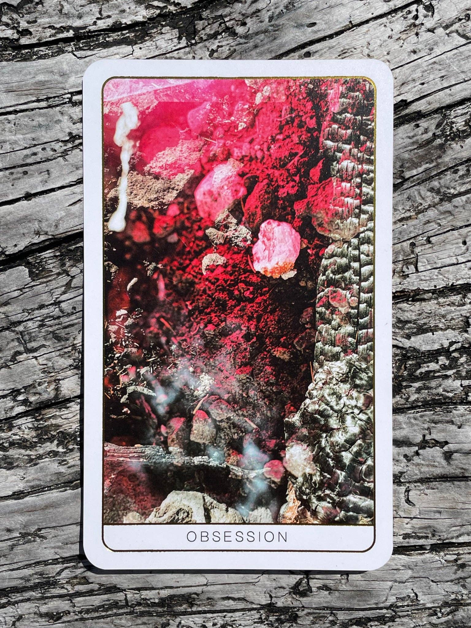 Death Doula Oracle Cards featuring original analogue 35mm photography with double exposure imagery, gold gilded edges and a guidebook for spiritual transformation and healing.