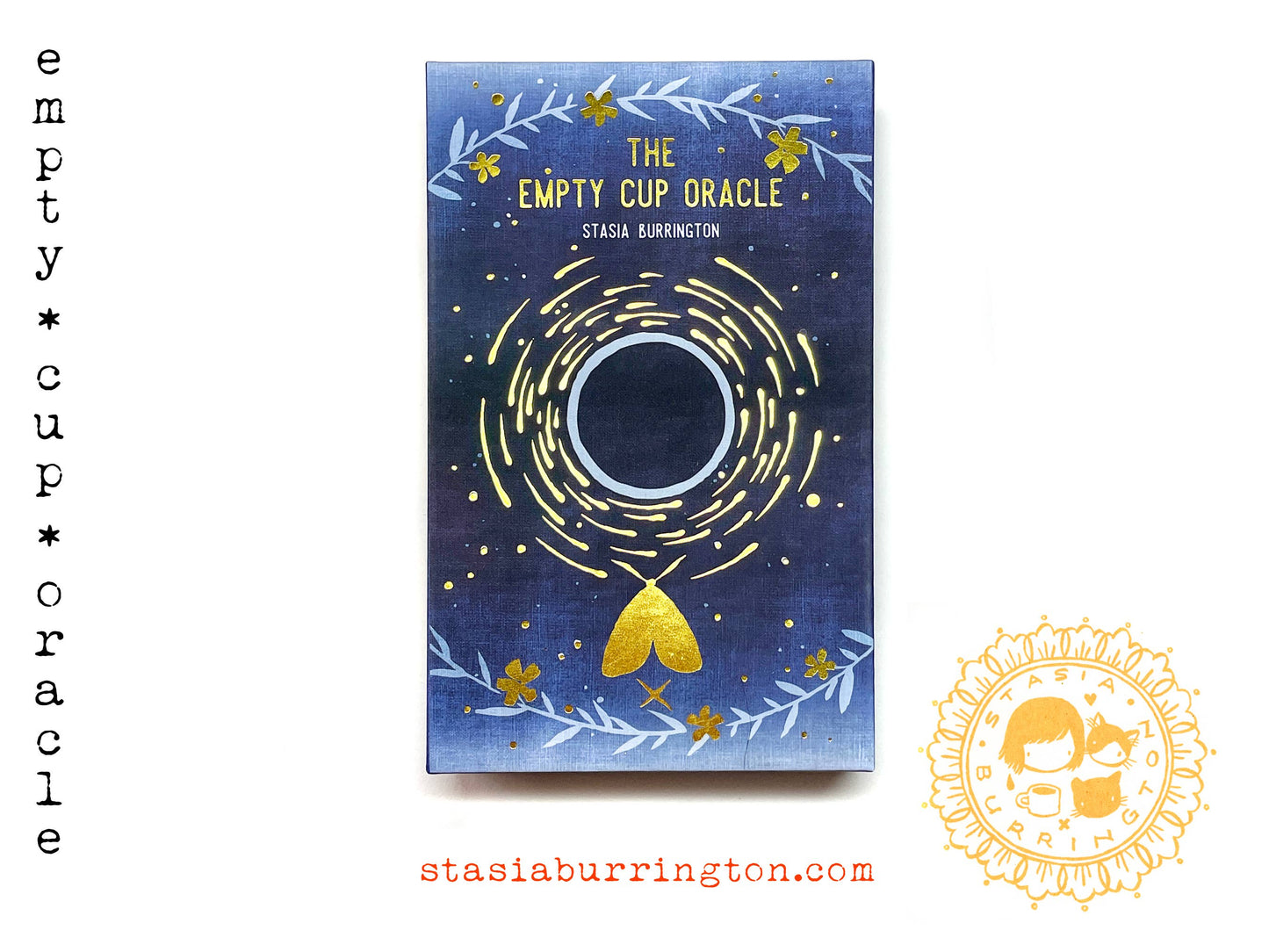The Empty Cup Oracle by Stasia Burrington featuring minimalist black ink illustrations, gold-edged cards, and a foil-stamped collector's box.