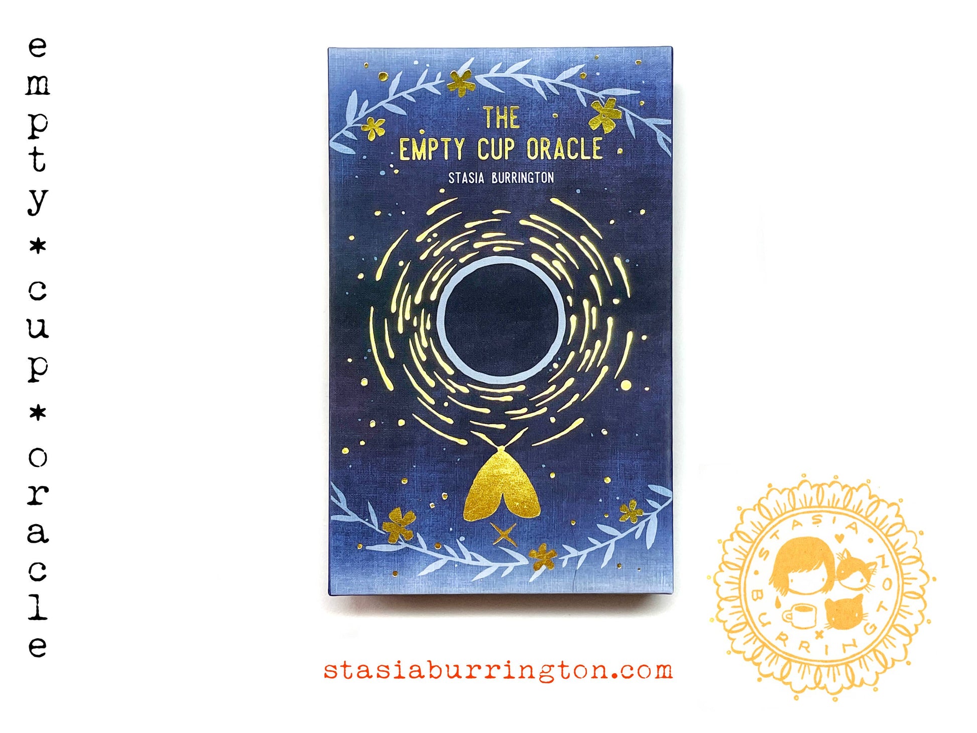 The Empty Cup Oracle by Stasia Burrington featuring minimalist black ink illustrations, gold-edged cards, and a foil-stamped collector's box.