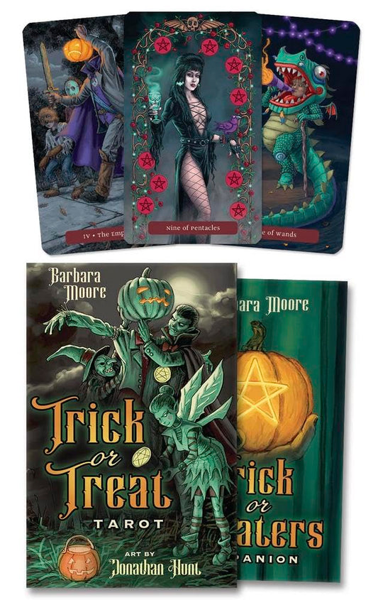 Set of tarot cards with Halloween-themed artwork and 'Trick or Treat Tarot' book by Barbara Moore.