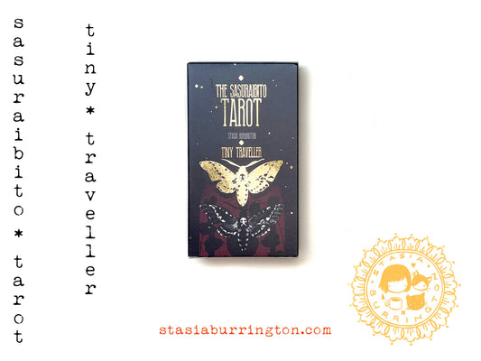 Tarot card deck packaging with butterfly design and text on a white background