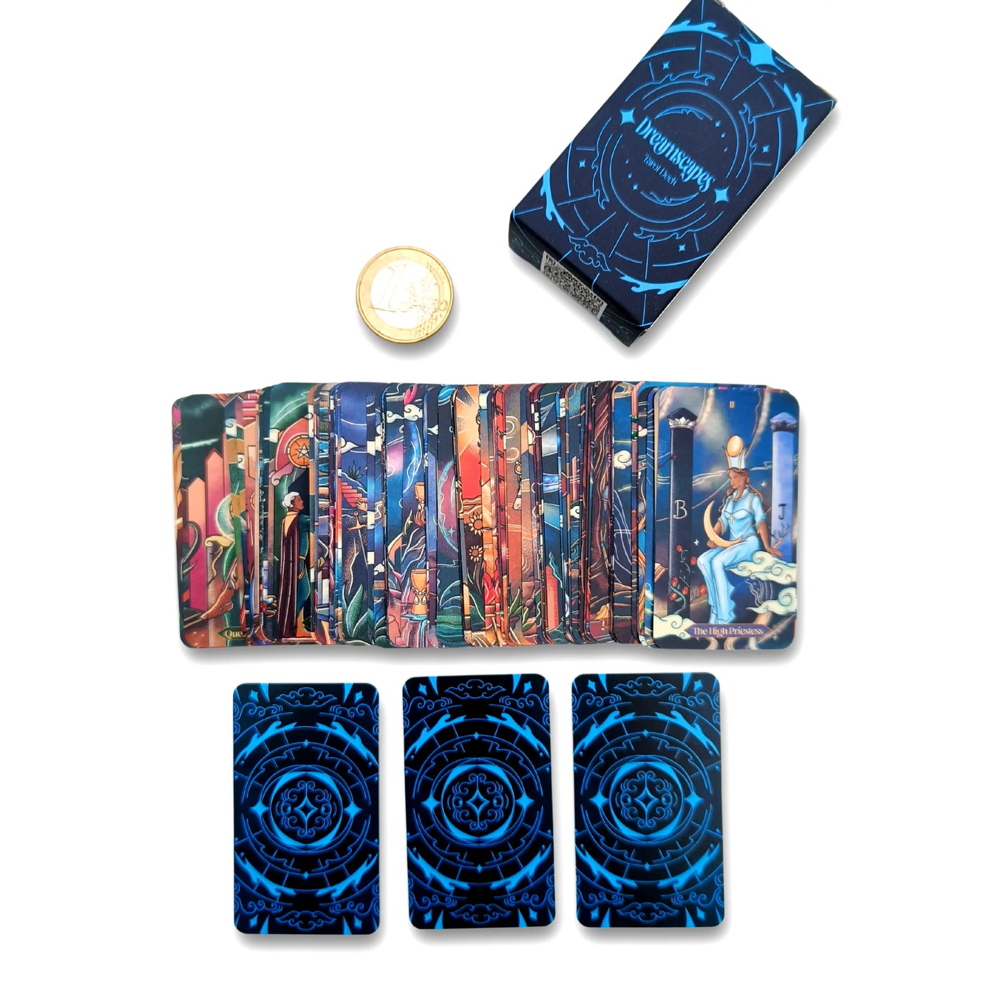 Set of tarot cards with colorful designs and blue circular symbols on a white background Dreamscapes tarot pocket edition