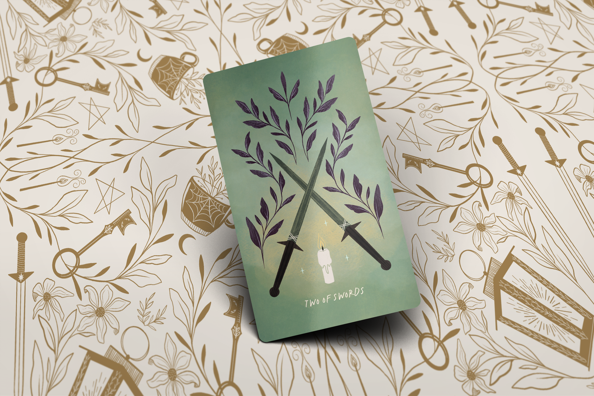 Green book with floral design on a patterned background