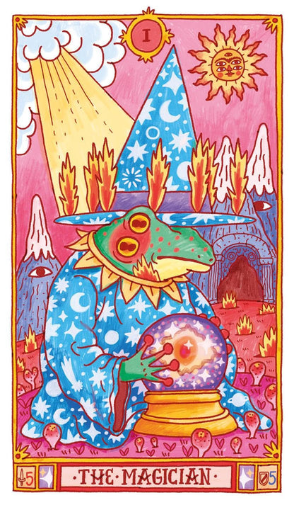 A colorful tarot card illustration titled 'The Magician' showing a green lizard-like figure in a blue starry hat and robe holding a crystal ball, with a sun, clouds, mountains, and flames in a pink and orange fantasy scene.