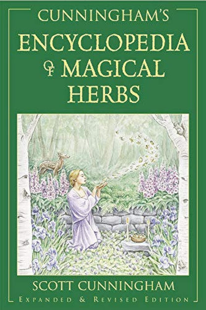 Cunningham’s Encyclopedia of Magical Herbs book showing herbal magic correspondences and spellwork uses