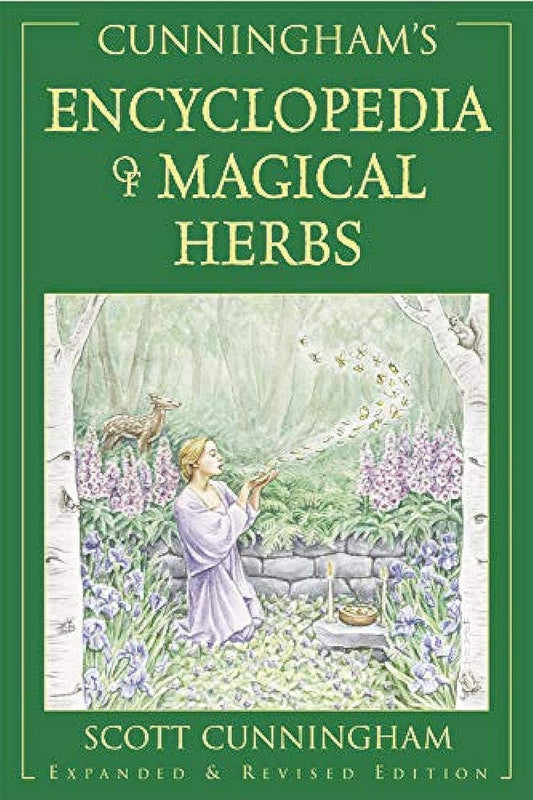 Cunningham’s Encyclopedia of Magical Herbs book showing herbal magic correspondences and spellwork uses