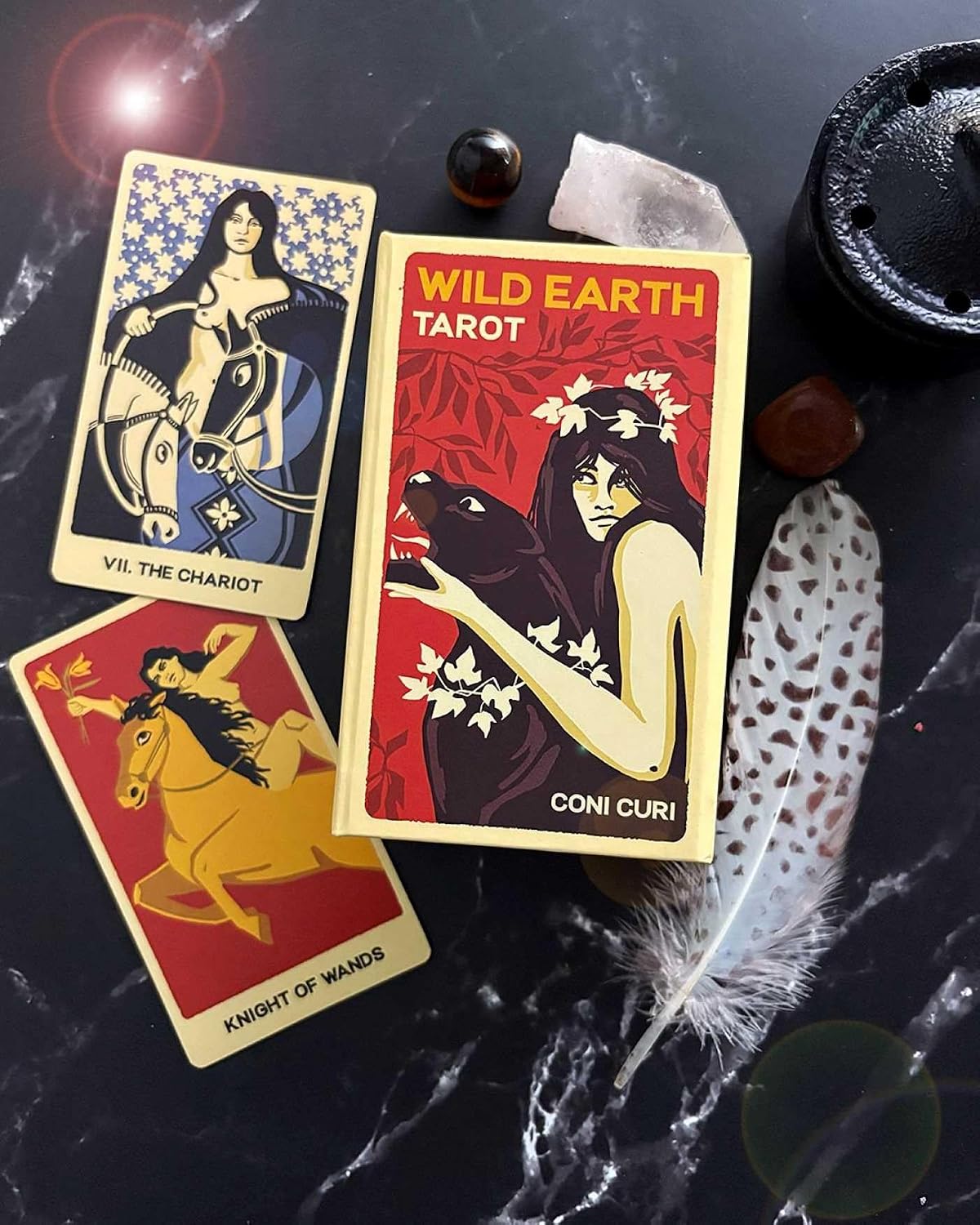 Wild Earth Tarot by Coni Curi featuring botanical illustrations, vintage-inspired artwork, Tarot de Marseille symbolism, and nature-based imagery. The chariot and Knight of wands 