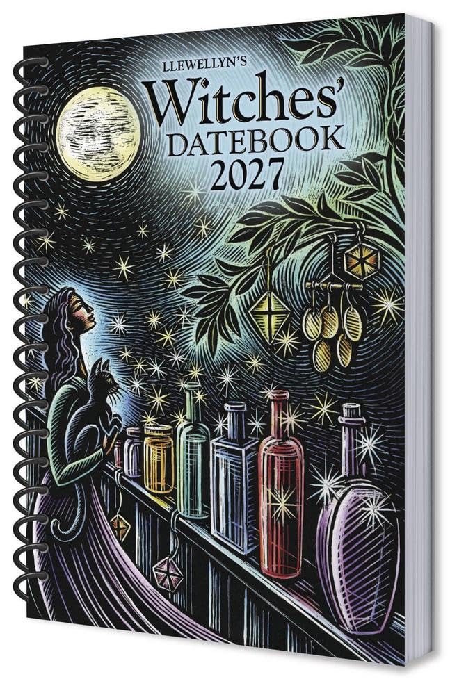 A spiral-bound 2027 'Witches Datebook' by Llewellyn's, featuring a detailed black and white illustration of a witch and cat under a full moon with colorful potion bottles on a shelf.