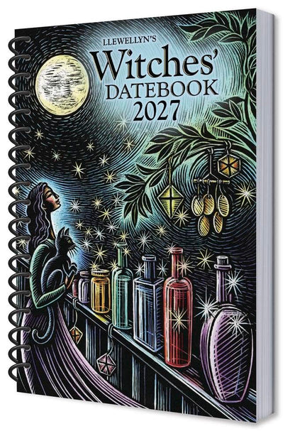 A spiral-bound 2027 'Witches Datebook' by Llewellyn's, featuring a detailed black and white illustration of a witch and cat under a full moon with colorful potion bottles on a shelf.