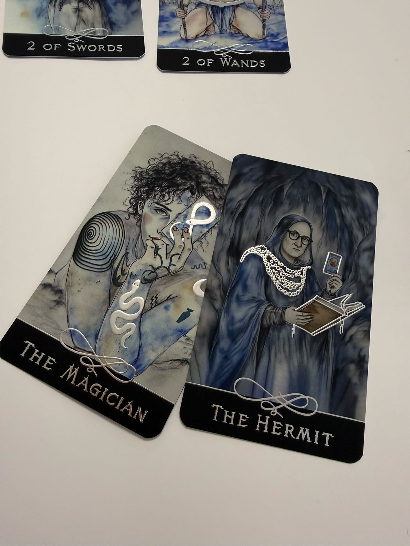 The Blue Tarot UK Exclusive Edition featuring cyanotype-inspired artwork by Kateryna and two exclusive UK alternate cards including The Hermit and The Magician.
