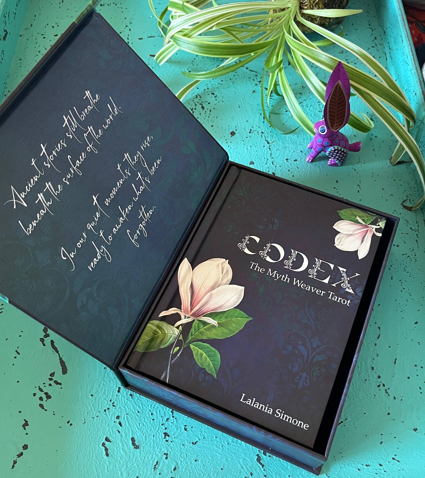 Myth Weaver Tarot deluxe set with cards, hardcover Codex book and magnetic box.