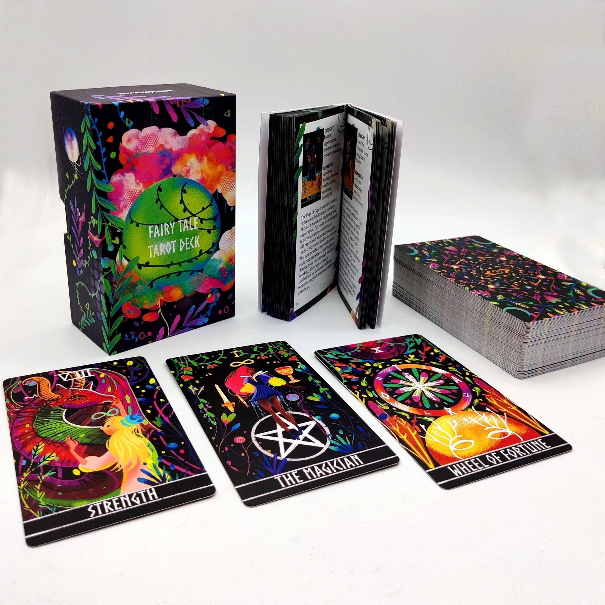 Colorful tarot cards with deck box and cards displayed on a white background