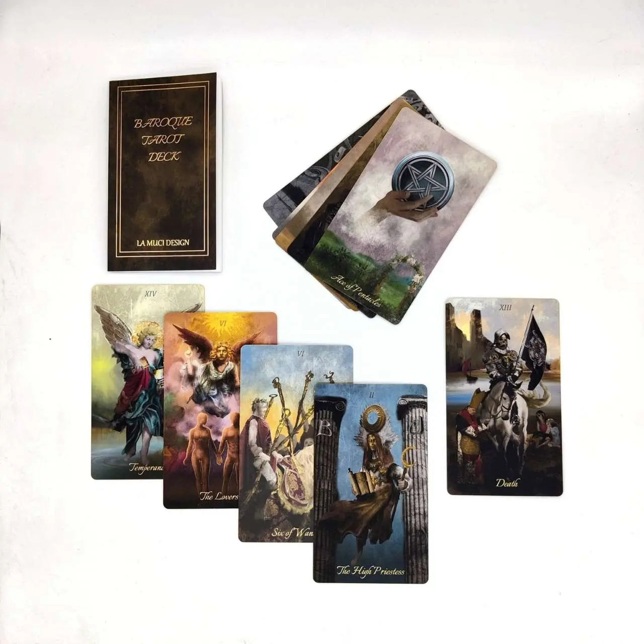 Collection of tarot cards with a deck book on a white background Baroque tarot La Muci 