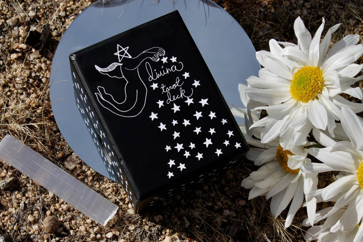 DIVINA Tarot Deck by Mary Elizabeth Evans featuring elegant monochrome pen and ink artwork with celestial symbolism and a 78-card indie tarot deck.