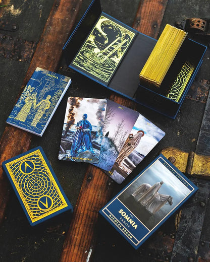 Somnia Tarot Revised Edition by Nicolas Bruno with surreal dream-inspired tarot artwork and gold gilded edges