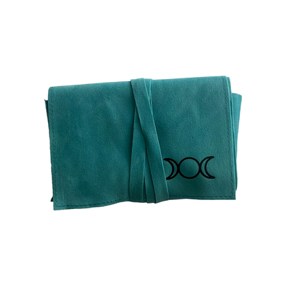 Teal tarot pouch  with a black triple moon symbol on a white background Oneness emporium