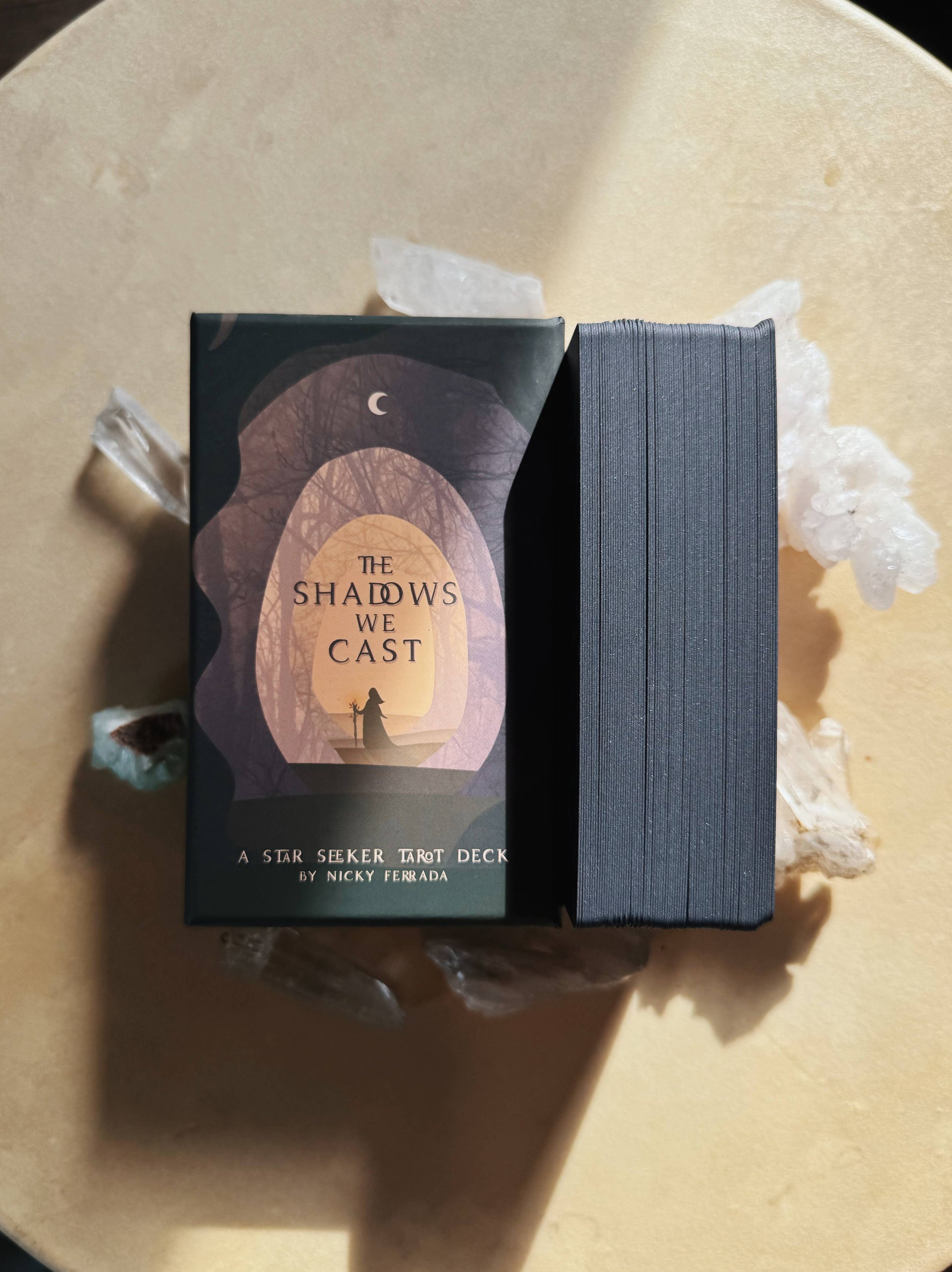 Shadows We Cast Tarot deck by Nicky Ferrada indie tarot with emotional artwork and shadow work theme
