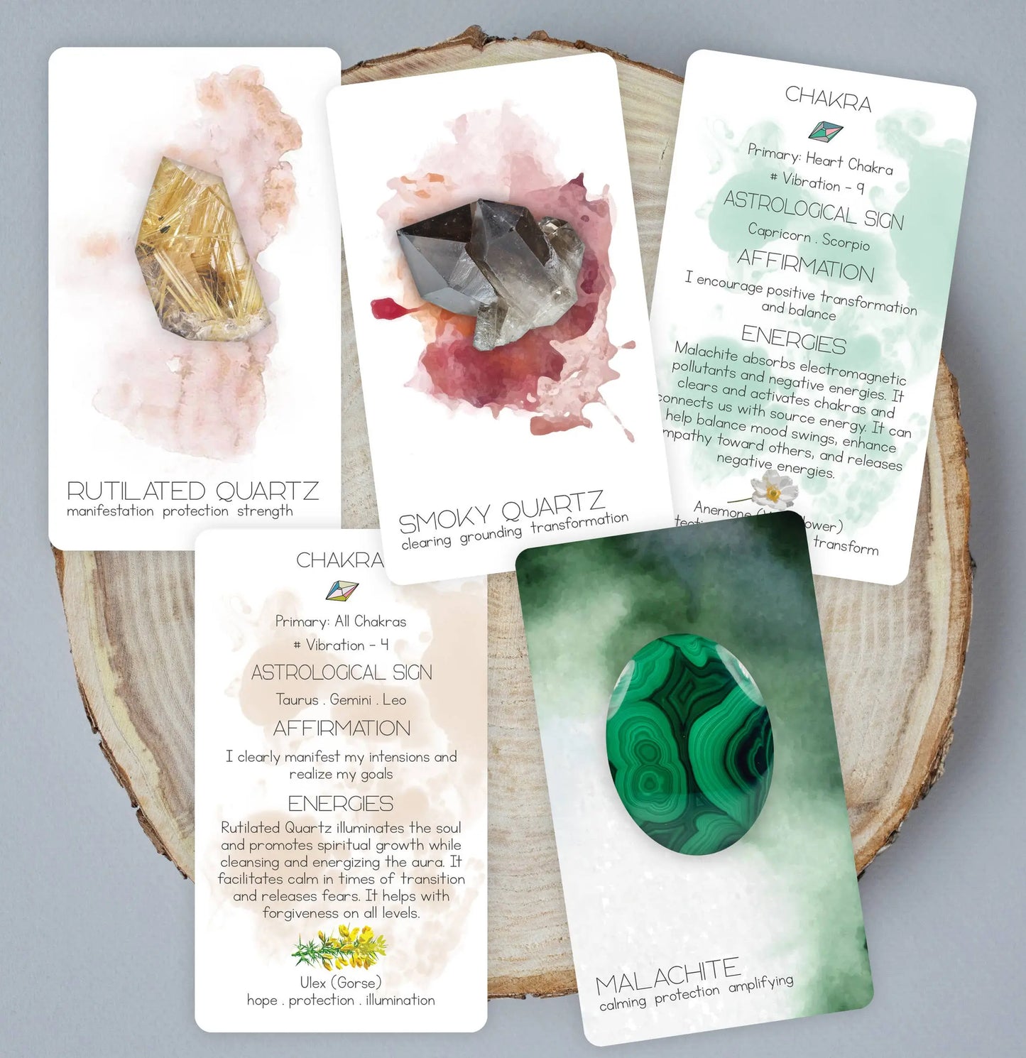 Set of crystal healing cards with images of crystals and text on a wooden surface. radiant crystal oracle