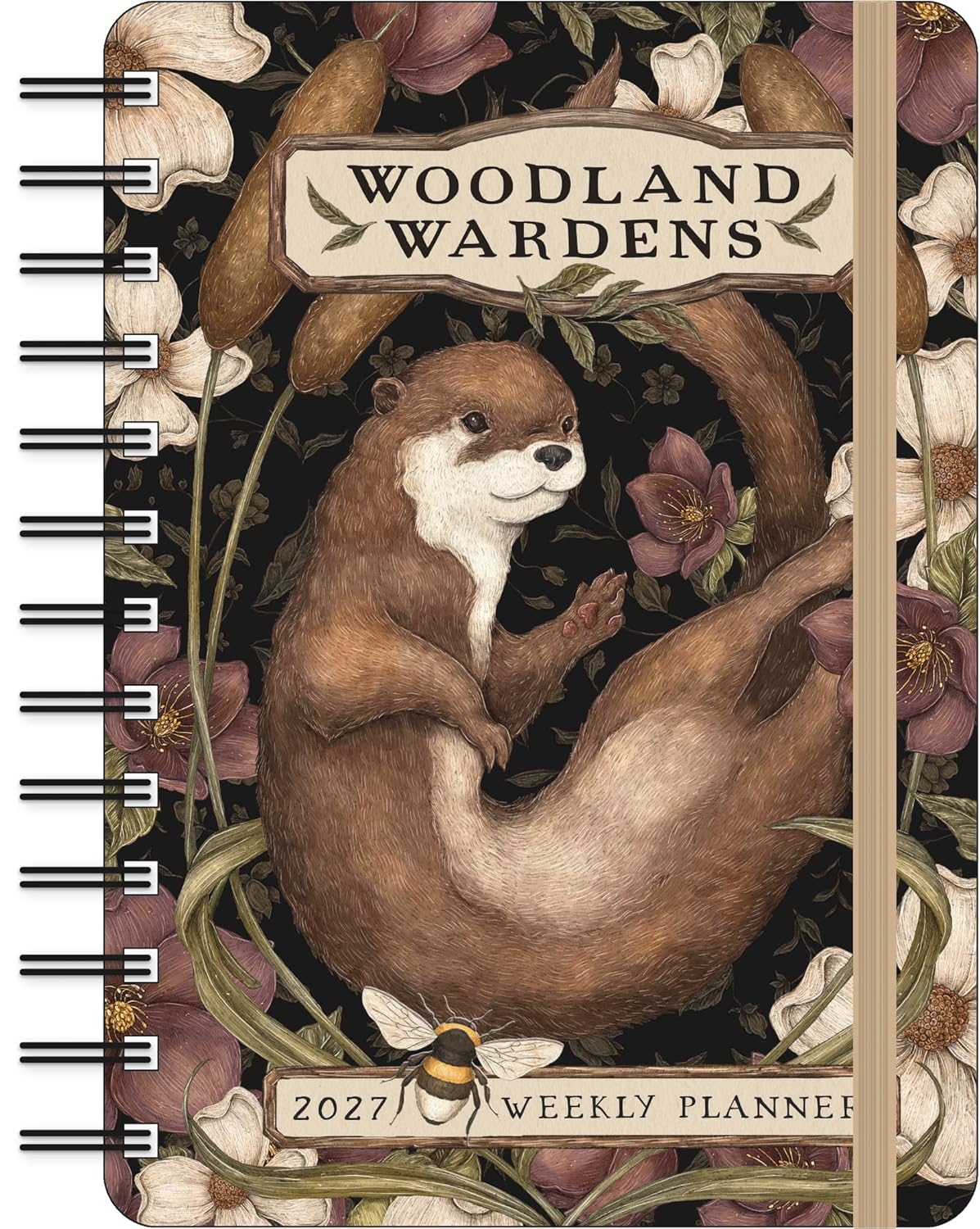 Woodland Wardens 2027 Weekly Planner with a spiral binding on the left and an elastic closure band on the right. The cover features an illustration of an otter surrounded by flowers and foliage, with the title 'WOODLAND WARDENS' at the top and '2027 WEEKLY PLANNER' at the bottom.