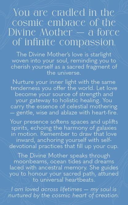 A blue square card or print with white text reading a spiritual message about Divine Mother and cosmic compassion, shown against a matching blue background.